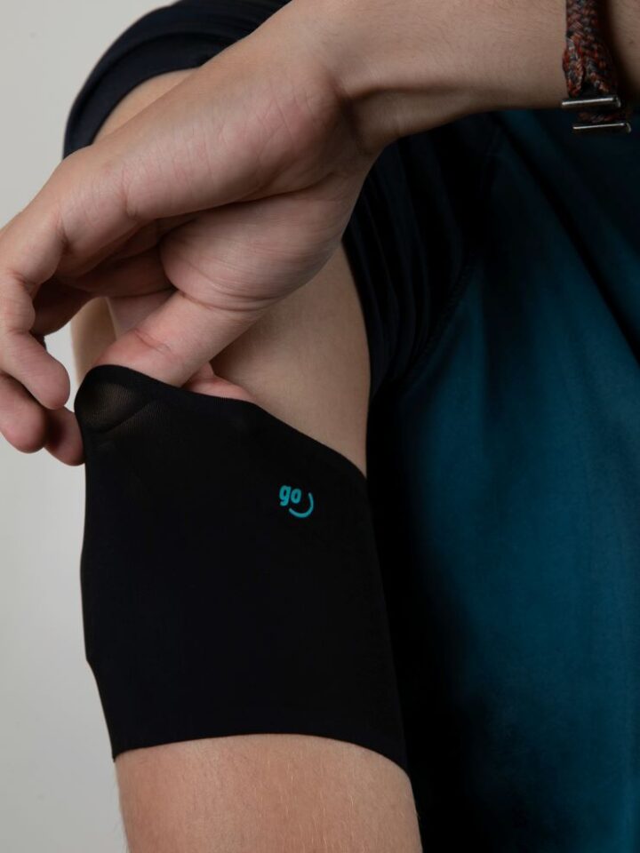 IMG_7589Shop Diathego - cover for glucose sensors and insulin pumps in Black on arm