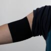 Diathego - cover for glucose sensors and insulin pumps in Black on arm